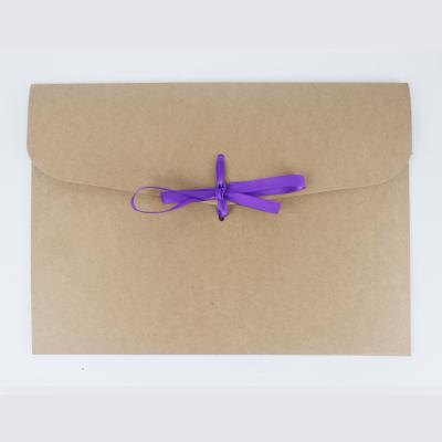 China Recyclable Printing A4 Kraft Paper Material Custom Envelopes With Ribbon Bow For Business Document Packaging for sale