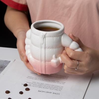 China Viable Korean Cute Ceramic Mugs Special Cute Cartoon Down Coat Shape Porcelain Coffee Couples Mug Cup With Handle for sale