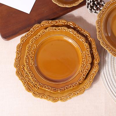 China Sustainable Vintage Royal Ceramic Stoneware Restaurant Dish Brown Glaze Embossed Dining Dish Set for sale