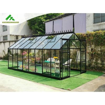 China Easily Assembled Year Around Production Huixin Metal 4mm Glass Parts 6x8m Glass Home Large Greenhouse For Outdoor for sale