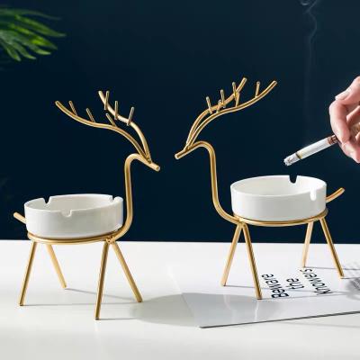 China Modern Design Wholesale Multifunctional Fawn Model Bulk Iron Ashtray Windproof for sale