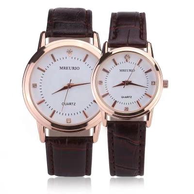 China Simple small brown three needle retail couple belt wrist quartz watches for men and women can be customized. for sale