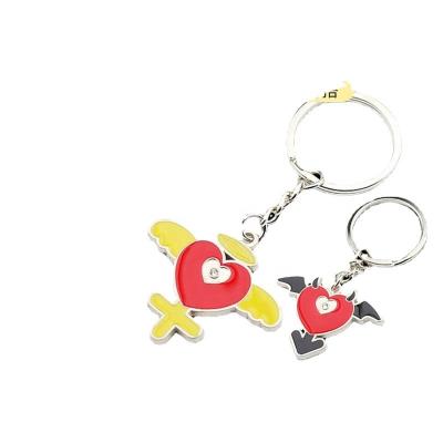 China Decoration Gift Merchants Batch Custom Paint Key Chains Stick Cartoon Pendant Enamel Key Chains for sale