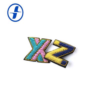 China Iron On Patches Fashion Custom High Quality Embroidery Patch For Apparel Letter Embroidery Patch for sale