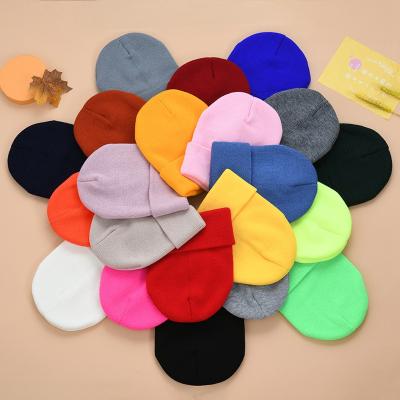 China JOINT Multiple Color Korean Version Keep Warm Knit Beanie Unisex Elasticity Crimping Solid Color Skull Cap Winter Hat for sale