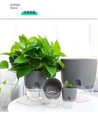 China Modern Indoor Office Round Transparent Hydroponic Plastic Planter Self Watering Plastic Flower Pots for sale