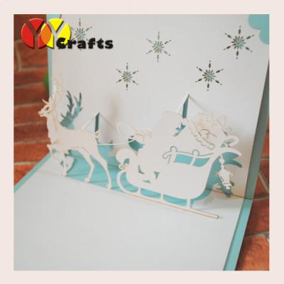 China Christmas greeting cards 3d pop up card laser cut santa claus and reindeer for sale