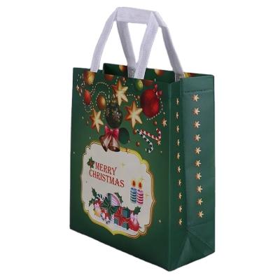 China Merry Santa Convenient Hot Sale Custom Logo Christmas Gift Non Woven Candy PP Lamination Tote Bag for sale