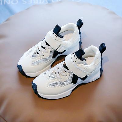 China Deodorization Fashion PU Walking Shoes Kids Breathable White Leather Casual Sneakers For Boys And Girls for sale