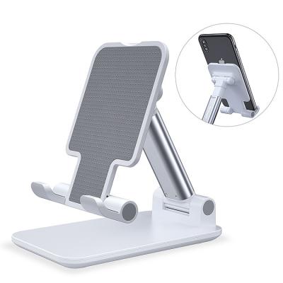 China 2020 New Universal Mobile Phone Foldable Tablet Bracket Stand Adjustable Stand Portable Desk Holder for sale