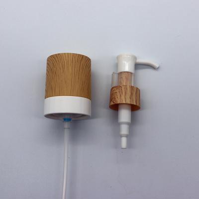 China good price child safe 24/410 28/410 bamboo lotion pump with cap wooden pump for cosmetic packaging for sale