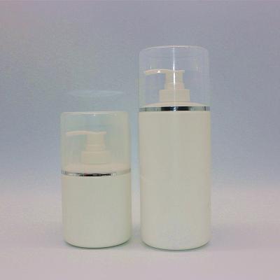 China Cosmetic Cosmetic Packaging 200ml 300ml 500ml 750ml Empty Round Bottom Plastic Lotion Bottle With Gold Cap for sale