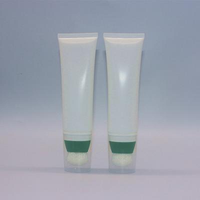 China 100ml 120ml Cosmetic Plastic Facial Remover Tube Packaging With Massage Soft Brush Application for sale