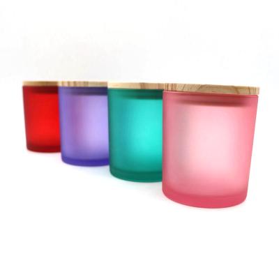 China Sustainable Luxury 10oz Custom Frosted Matte Multi Color Empty Candle Jars With Bamboo Wood Lids for sale