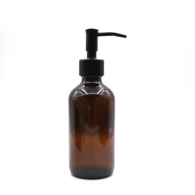 China Hot Sale 240ml Glass Boston Cosmetic Bottle With Matte Black Pump For Lotion / Soap Dispenser for sale