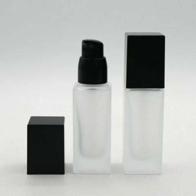 China Eco - Friendly Recyclable 30ml Square Frosted Foundation Liquid Makeup Liquid Glass Bottle With Pump for sale