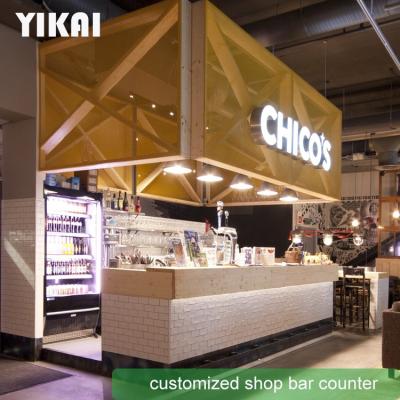 China Coffee Milk Tea Cafe Bar Counter Store Display Furniture Customized Wall Cabinets Stand Mall Store Design Decoration for sale