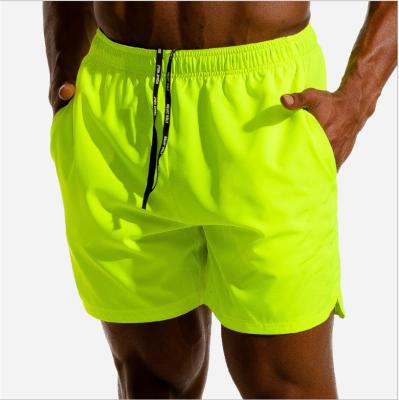 China 2022 New Summer Men's Anti-Wrinkle Fitness Clothes Quick-drying Drawstring Waist Jogging Elastic Fitness Shorts For Men for sale