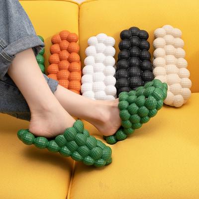 China 2022 Fashion Trend New Solid Color Bubble Slippers Women One-Step Indoor Korean Soft Home Men Men Non Slip EVA for sale