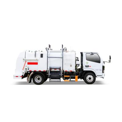 China Construction Material Stores FULONGMA FAW Chassis 7T Electric Trash Compactor Truck for sale