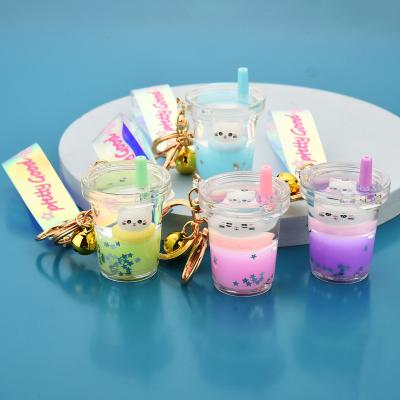 China Advertising Cat Doll Acrylic Key Chain Liquid Glitter Keychain Cute Cat Milk Tea Floating Bottle Gift Wholesale Price for sale