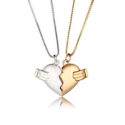 China Trendy Personalized Couple Necklace Creative Broken Heart Magnet Gold And Sliver Necklace for sale