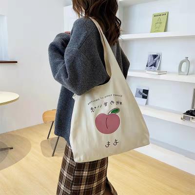 China Other One Shoulder Girls Large Tote Bag Korean Simple Beige Student Printed Canvas Handbags for sale