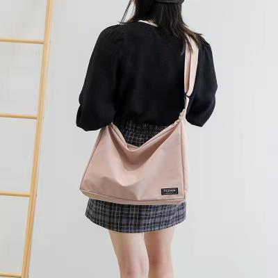 China Niche girls shoulder bag canvas cross the latest/fall and winter new fashion student fasion - body bag for sale