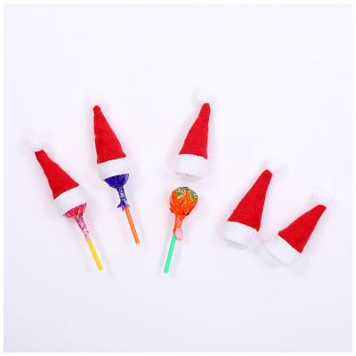 China YIWU Christmas Gift Christmas Party Lollipop Candy Eco-friendly Santa Hat Mini Lollipops Christmas Hat for sale