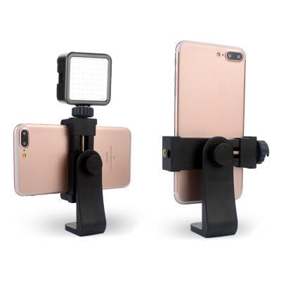 China Newest Hot Adjustable Plastic Phone Mount Holder Universal 360 Degree Rotation Mobile Phone Holder For Tripod for sale