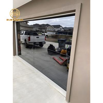 China Commercial Atomic Windproof Garage Door Supplier Roll Up Tempered Glass Sectional Garage Door For Home for sale