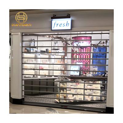 China Anti Theft Aluminum Frame Automatic Roll Up Transparent Polycarbonate Roller Shutter Door for sale