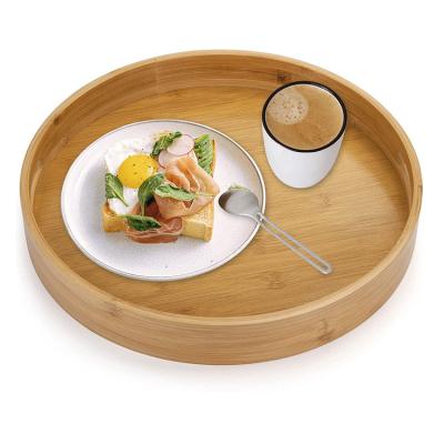 China Easy To Use Multifunctional Bamboo Round Bamboo Serving Tray With Handle for sale