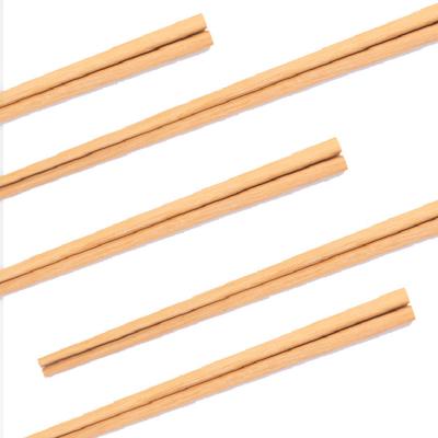 China Disposable High Quality Yellow Sandalwood Chopstick With Custom Logo Reusable Chop Sticks for sale