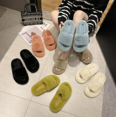 China Fuzzy Indoor Plush Faux Fur One Word Exquisite One Word TPR Winter Fluffy Slippers For Women Lady for sale