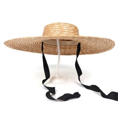 China Natural Beach Straw Hat For Women Summer Girl Fashion Character Big Brim Panama Sun Sombreros Hat Wholesale Ribbon Rope Wide for sale