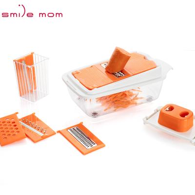 China Multi Viable Potato Shredder Hand Kitchen Mom Smile Vegetable Slicer Grater With Blade Storage for sale