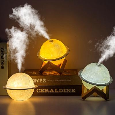 China Portable Car Travel Around Night 200ml Aroma Essential Oil Diffuser Damp Air Humidifier Colorful USB Ultrasonic Mini Planet Light for sale