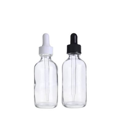 China Wholesale spot Boston essential oil bottle 60ml transparent blue glass dropper bottle black plastic cap for sale