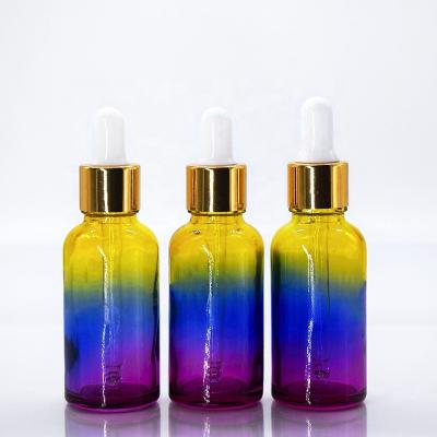 China Color essential oil bottle Gradual color can be customized 20ml30ml50ml cosmetic glass essence liquid dropper bottle with straw for sale