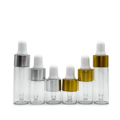 China 2ml 3ml 4ml 5ml Wholesale Custom Essential Oils Cosmetic Bottle Mini Round Glass Dropper Bottle with metal lid for sale