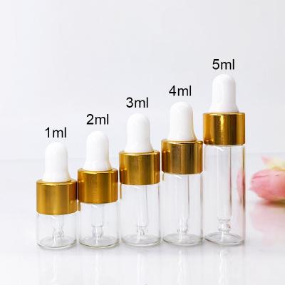 China 1ml2ml3ml4ml5ml Mini transparent glass dropper bottle, empty essential oil dropper bottle and perfume liquid container for sale