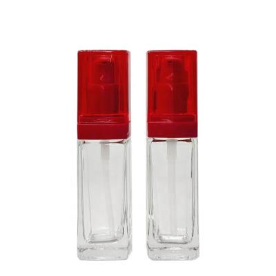 China Factory wholesale square foundation bottle 30ml square glass bottle lotion pump with red plastic cover for sale