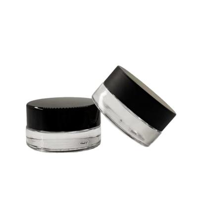 China Glass Eye Cream Bottle 3g5g Thick Bottom Face Cream Bottle With Black Plastic Cap for sale