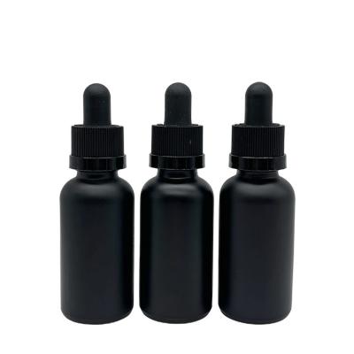 China Factory Wholesale 30ml Black Frosted Glass Dropper Bottle Matte Black Essential Oil Bottle Beard Child Protective Cover for sale