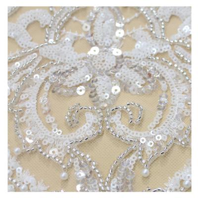 China Viable order luxury swiss luxury bridal apparel white beaded veil lace fabric for sale