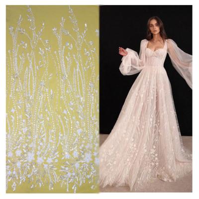 China Viable. Wholesale high quality design Mesh Elegant Sequin Bridal Embroidery beaded lace fabric for wedding dress. for sale