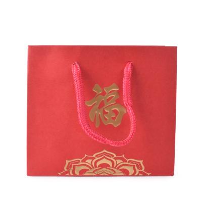 China Customized Wholesale Cheapest Handmade Design Paper Cardboard Jewelry Packaging Paper Bag for sale