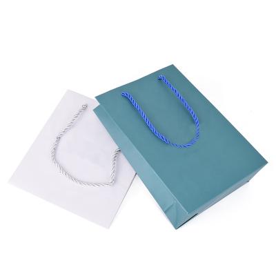 China Jewelry Box Square Gift Bottom Bags Glitter Clothing Shopping Paper Bag With Logo Bag Hot Stamping for sale