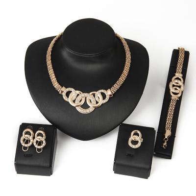 China Gold Crystal Necklace Earring Bracelet Ring high quality set rhinestone simple new dress jewelry sets for women for sale